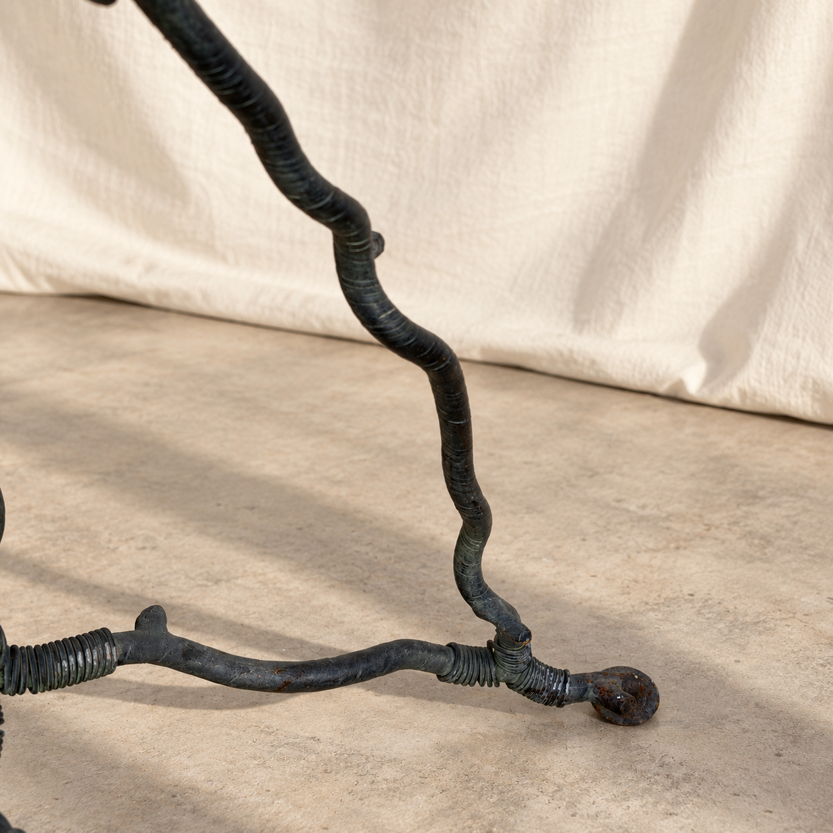 Root-form base of sculptural metal tree floor stand