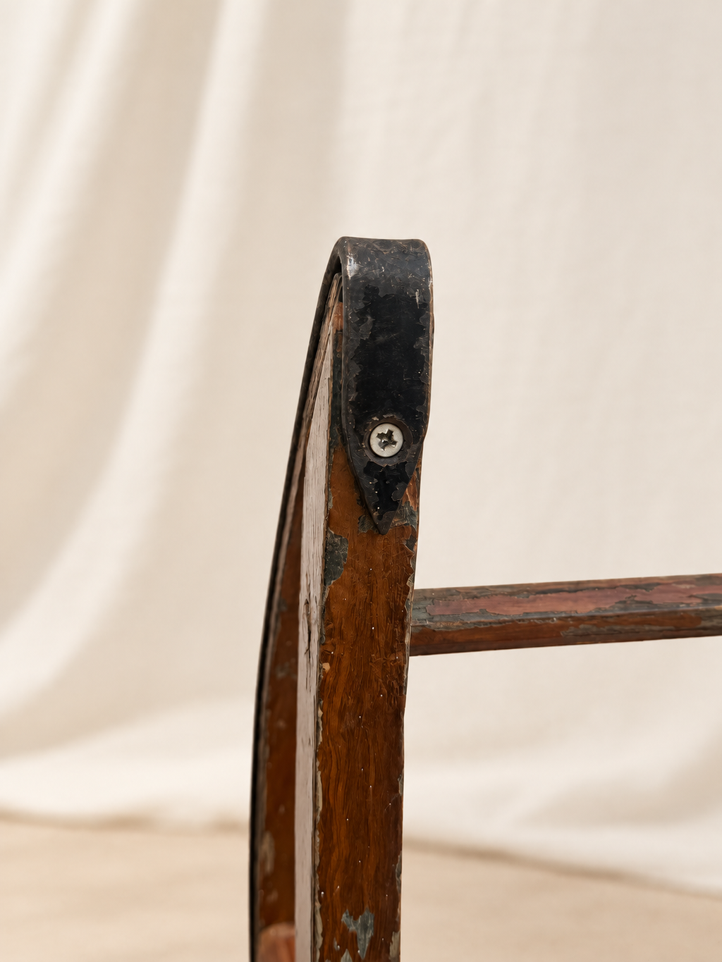 Weathered wood and iron details on 19th-century primitive sled