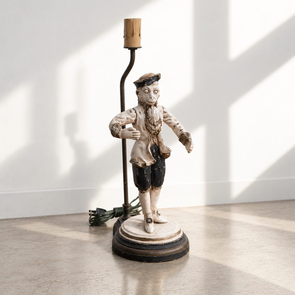 Decorative monkey table lamp on cream and black stepped base