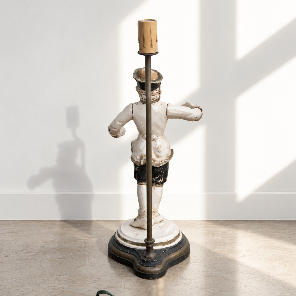 Back view of singerie monkey table lamp with metal support