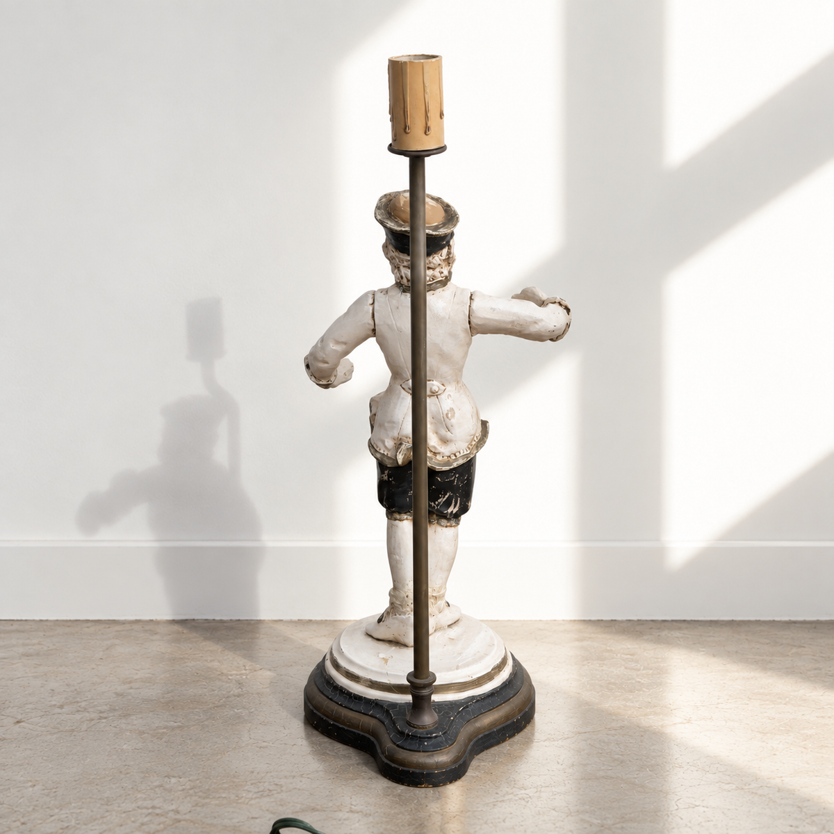 Back view of singerie monkey table lamp with metal support