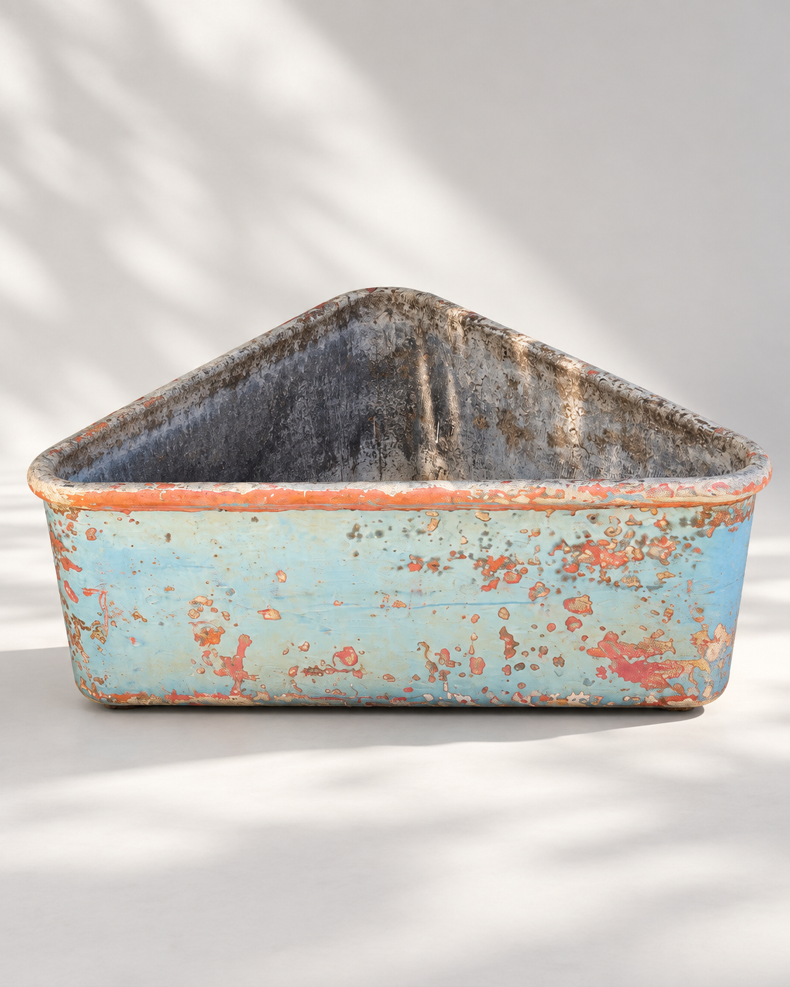 Triangular garden planter with distressed blue painted finish