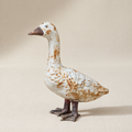 Painted cast metal goose garden statue with weathered white finish
