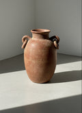 Antique earthenware amphora vase with two loop handles