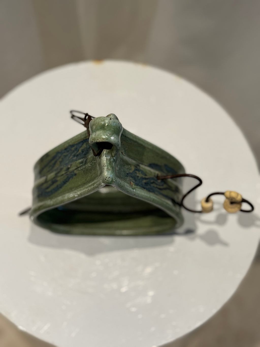 Vintage J.S. ceramic wall pocket planter with textured green glaze and metal rod for hanging, rustic decorative accent with organic charm — Hommes and Gardens, Objects Collection, Landscape Architect, Interior Designer, Outdoor Living, Art, Furniture, Objects, Best Gifts, Nature, Backyard, Yard, Outdoor Decorations, Home Decor, Home Design, Luxury Design.