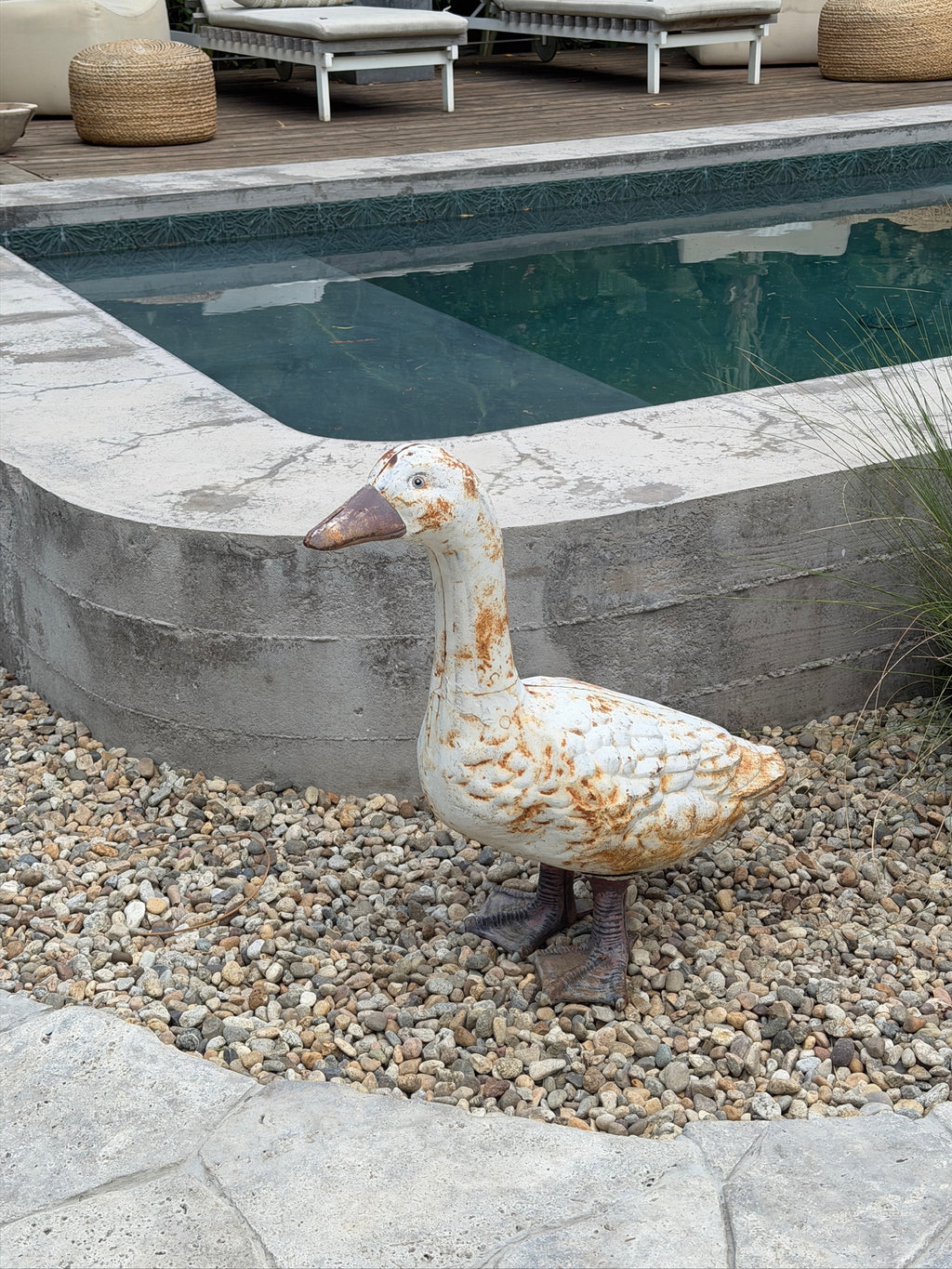 Decorative cast metal goose sculpture for garden or patio