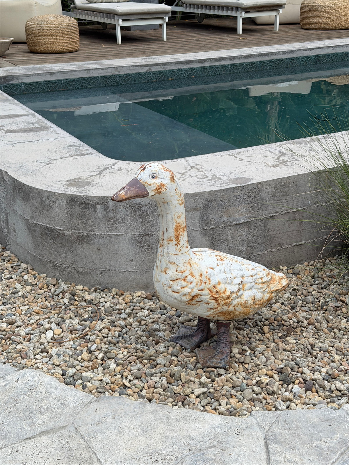 Decorative cast metal goose sculpture for garden or patio
