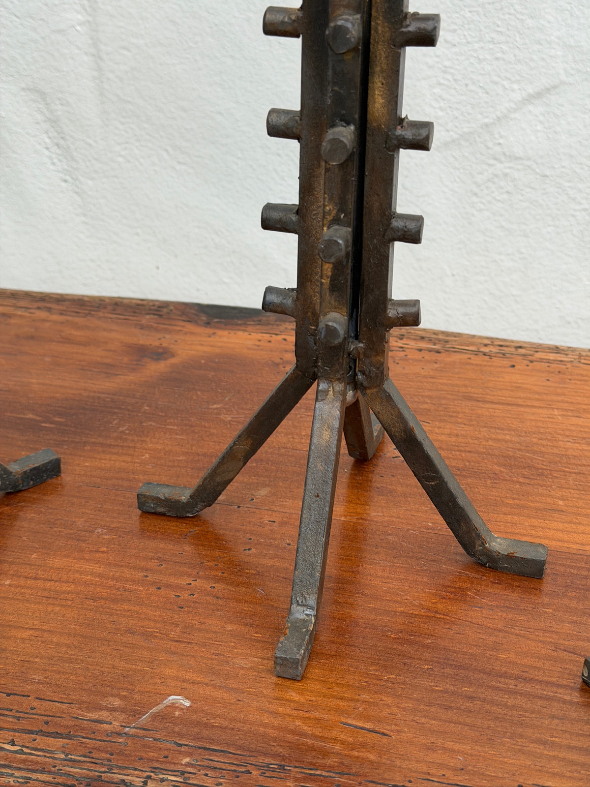 Base of vintage wrought iron floor candlestick