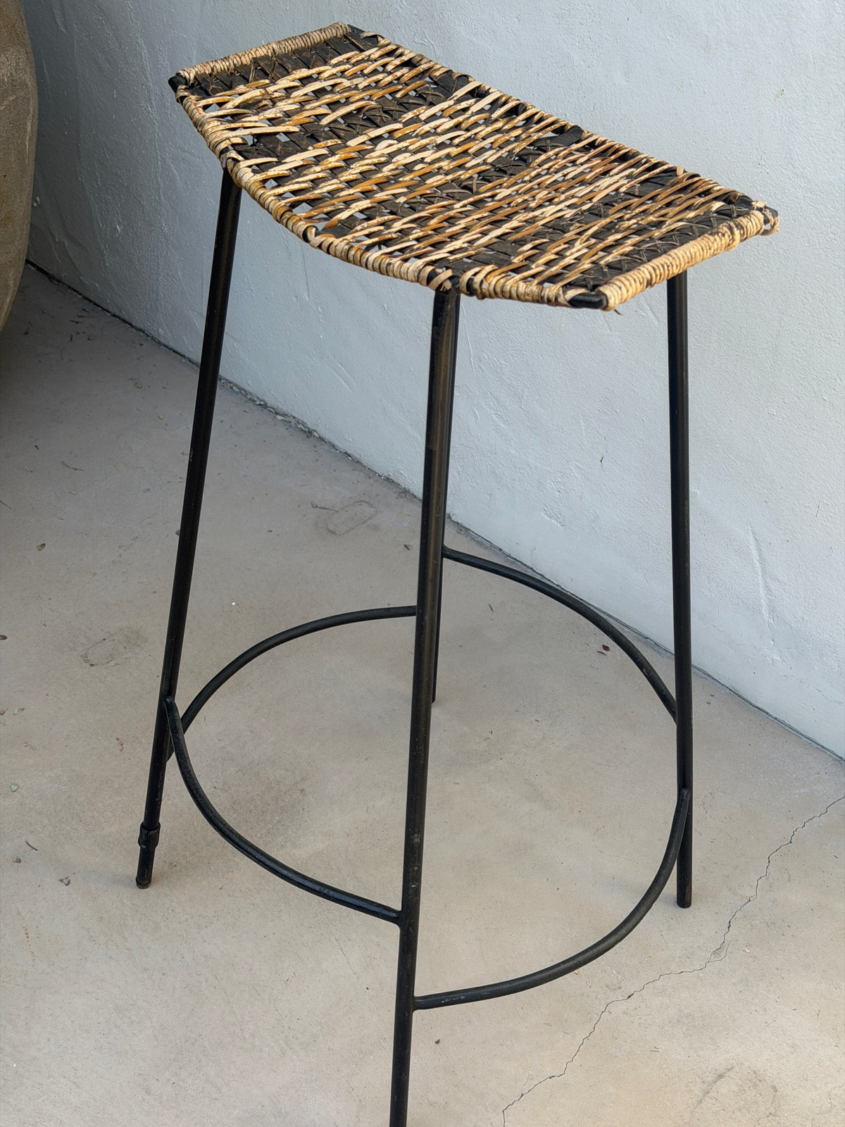 Black iron frame and footrest on Arthur Umanoff bar stool