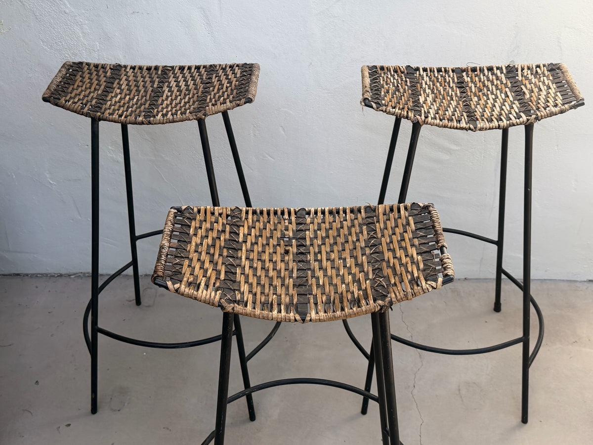 Sculptural wicker seat and iron frame on mid-century bar stool