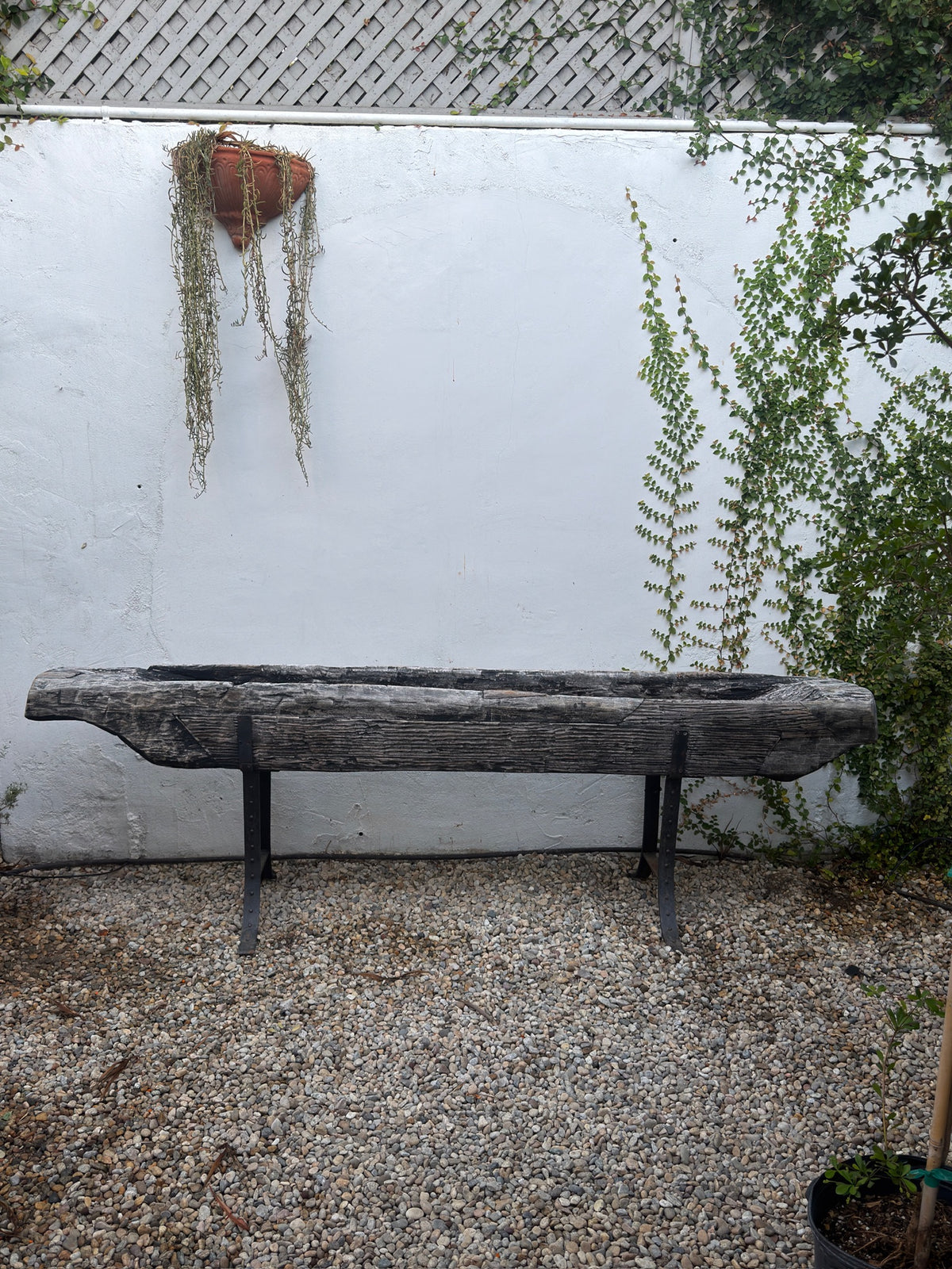 Antique hand-hewn wooden trough with weathered surface