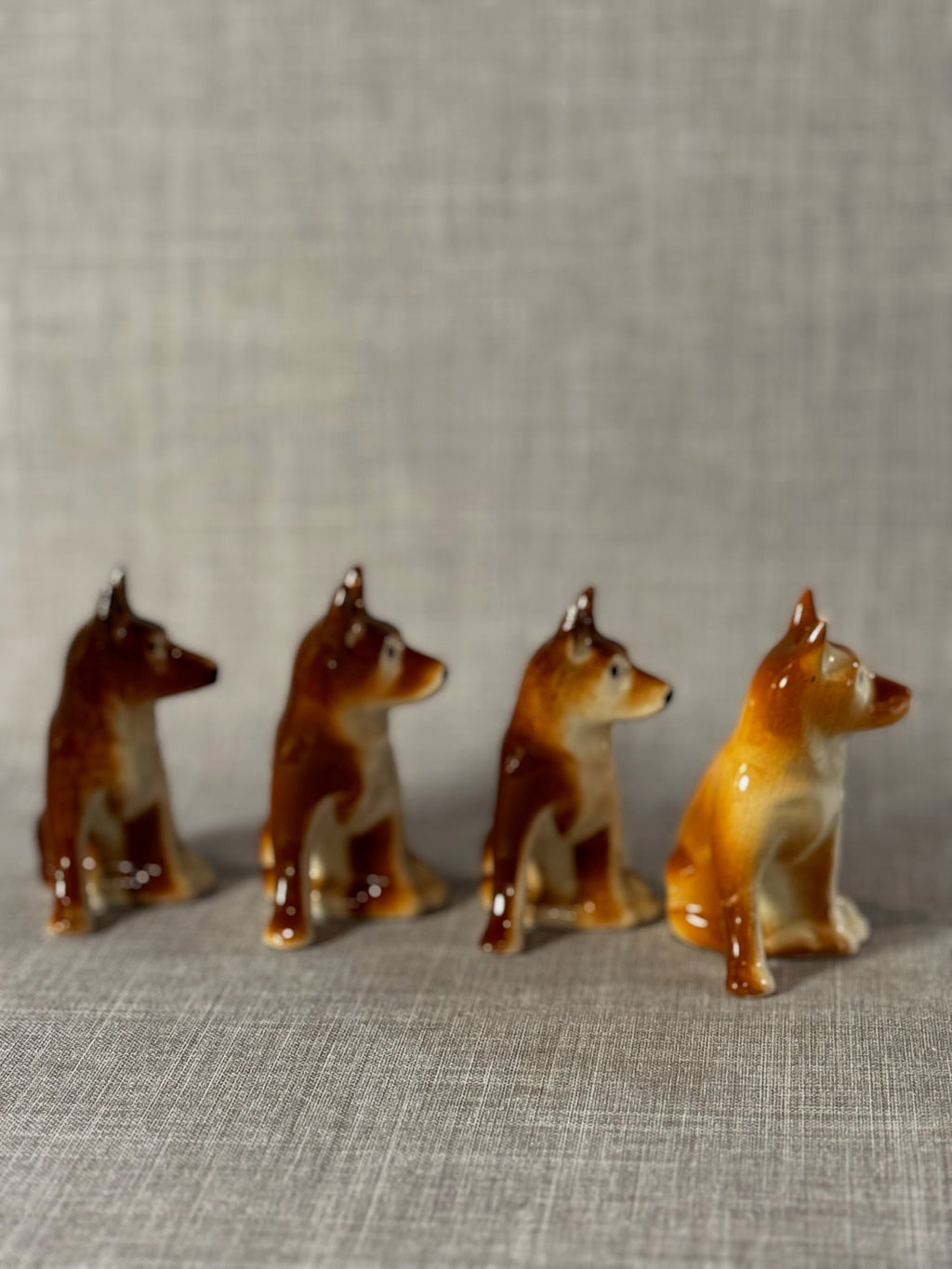 Set of 4 Vintage Hand-Painted Ceramic Sitting Dogs – Brown & Cream Glazed Figurine Pack