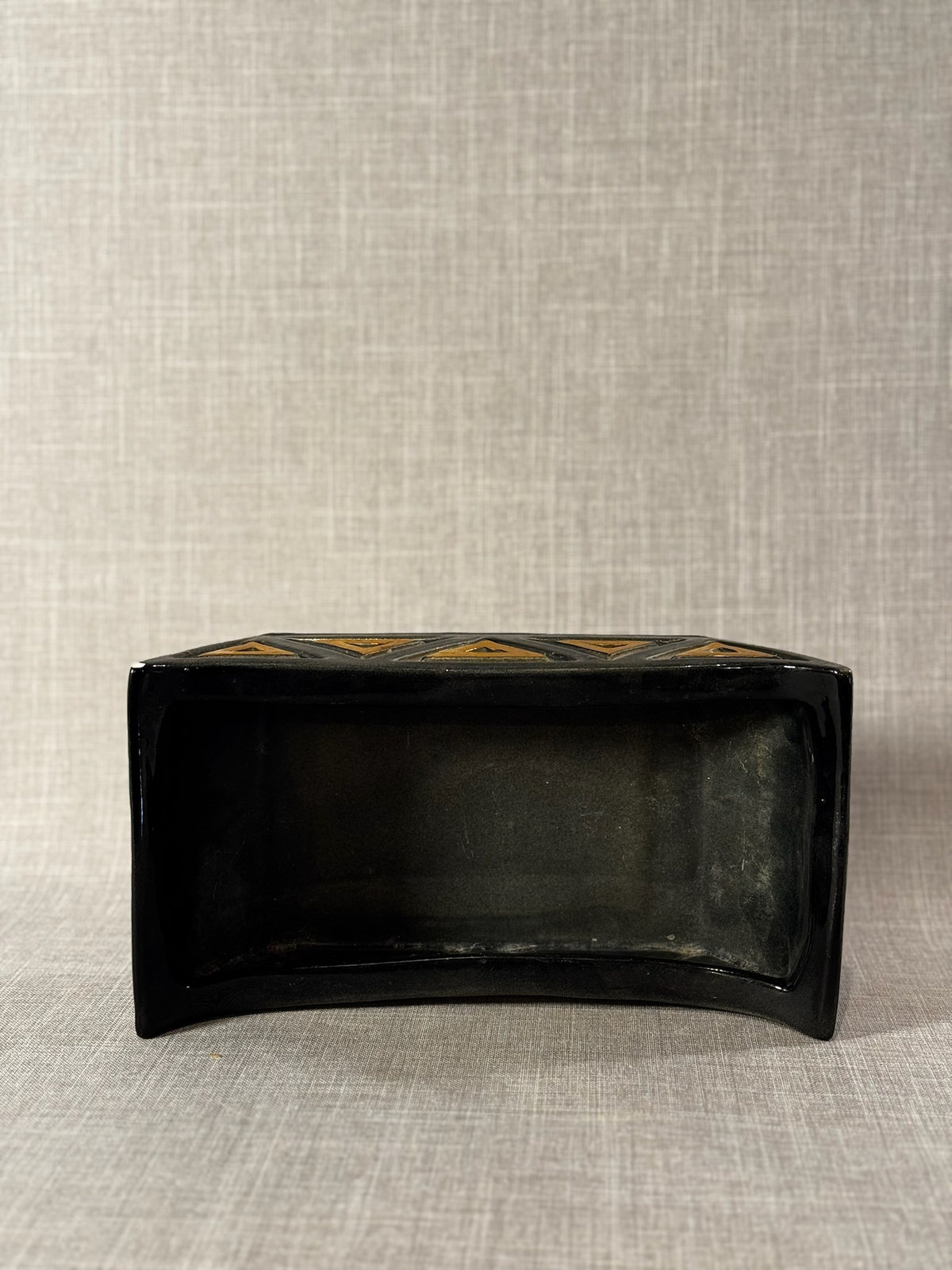 retro canoe planter black and mustard geometric design