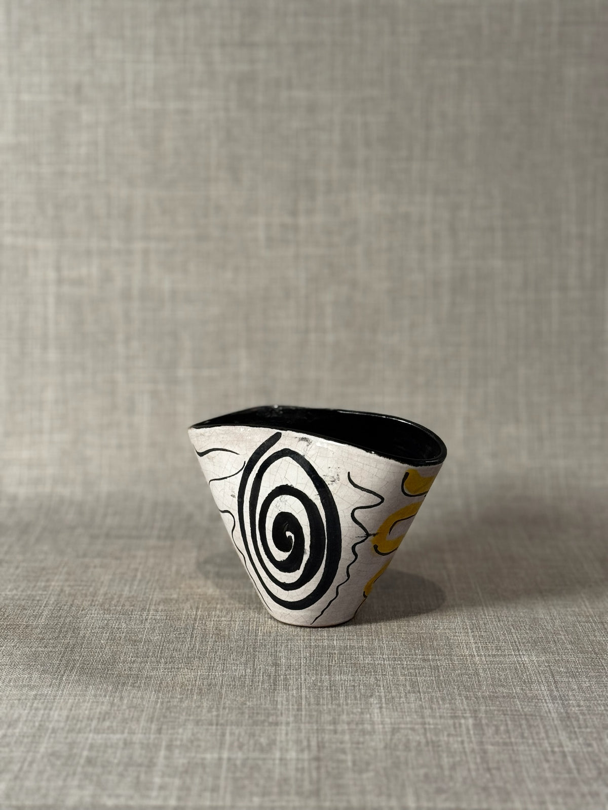 handmade studio pottery cone bowl with abstract spiral artwork