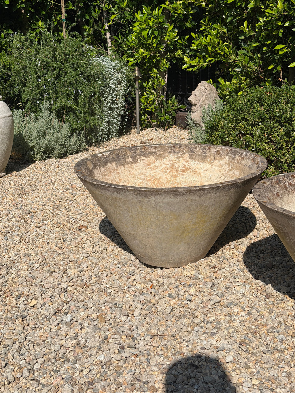 - Weathered Willy Guhl garden planter with architectural conical form