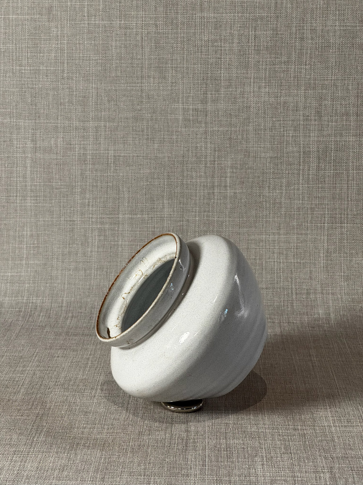 Elegant Handcrafted White Stoneware Vessel with Warm Rustic Rim Accents