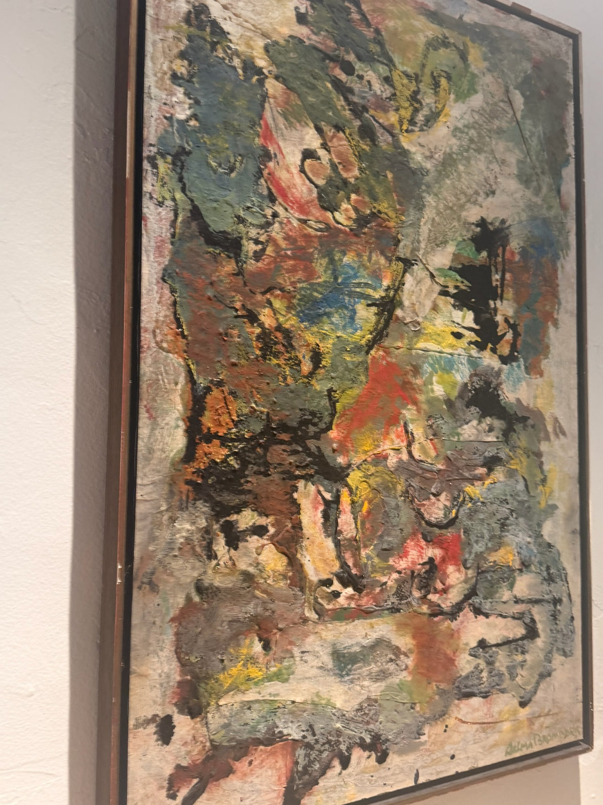 Side view showing dimensional impasto texture on abstract artwork