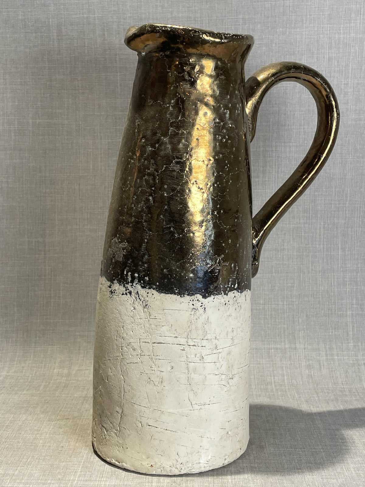 rustic handmade terracotta vase with gold finish detail
