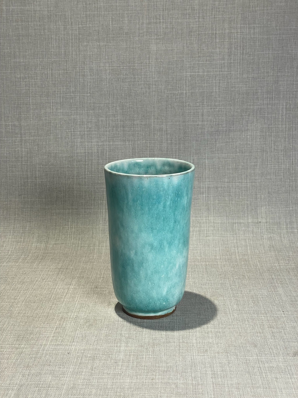 turquoise ceramic drinking cup