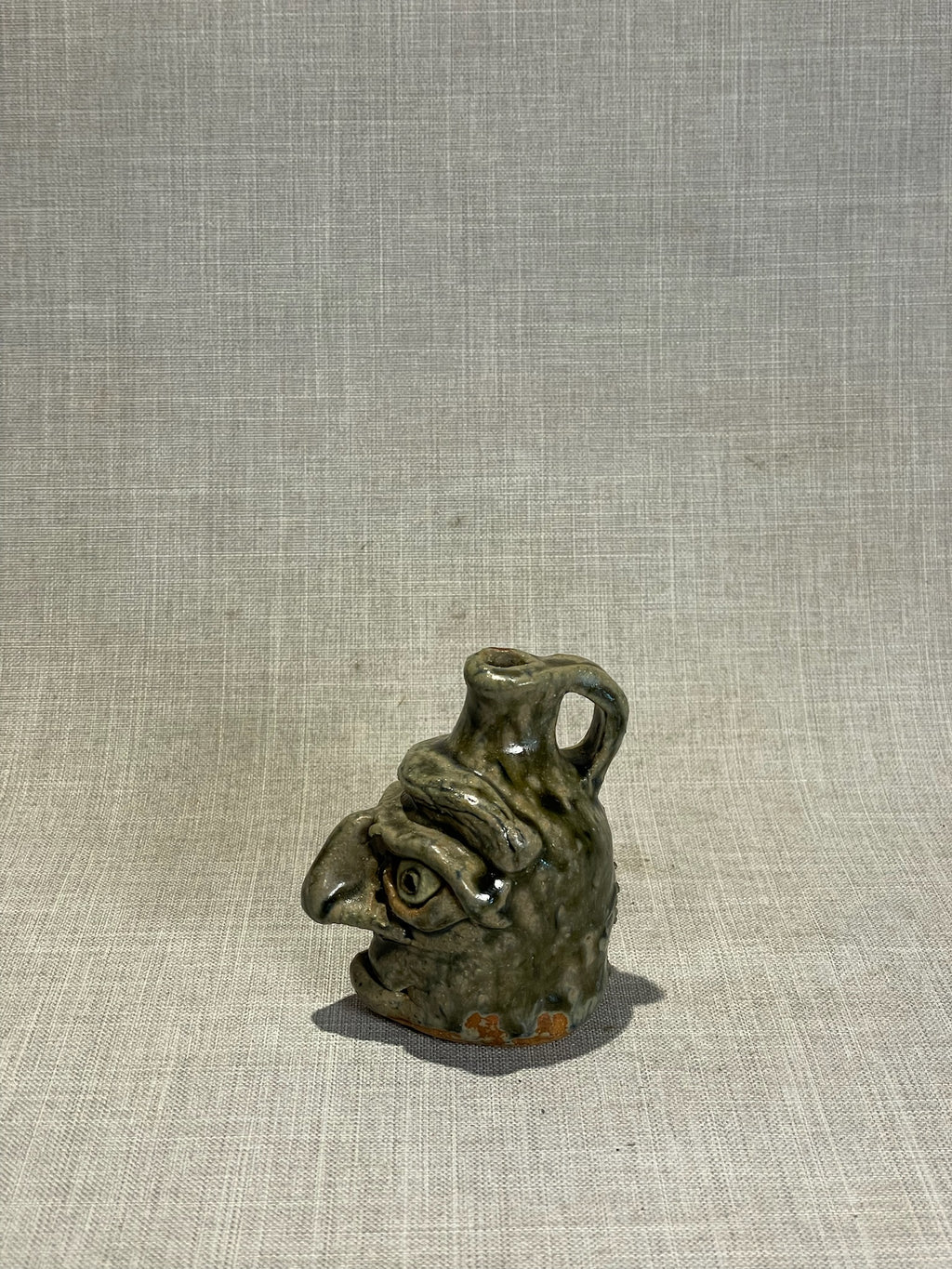 Signed Studio Art Pottery Face Jug “April Flowers” with Expressive Sculpted Features and Olive Drip Glaze