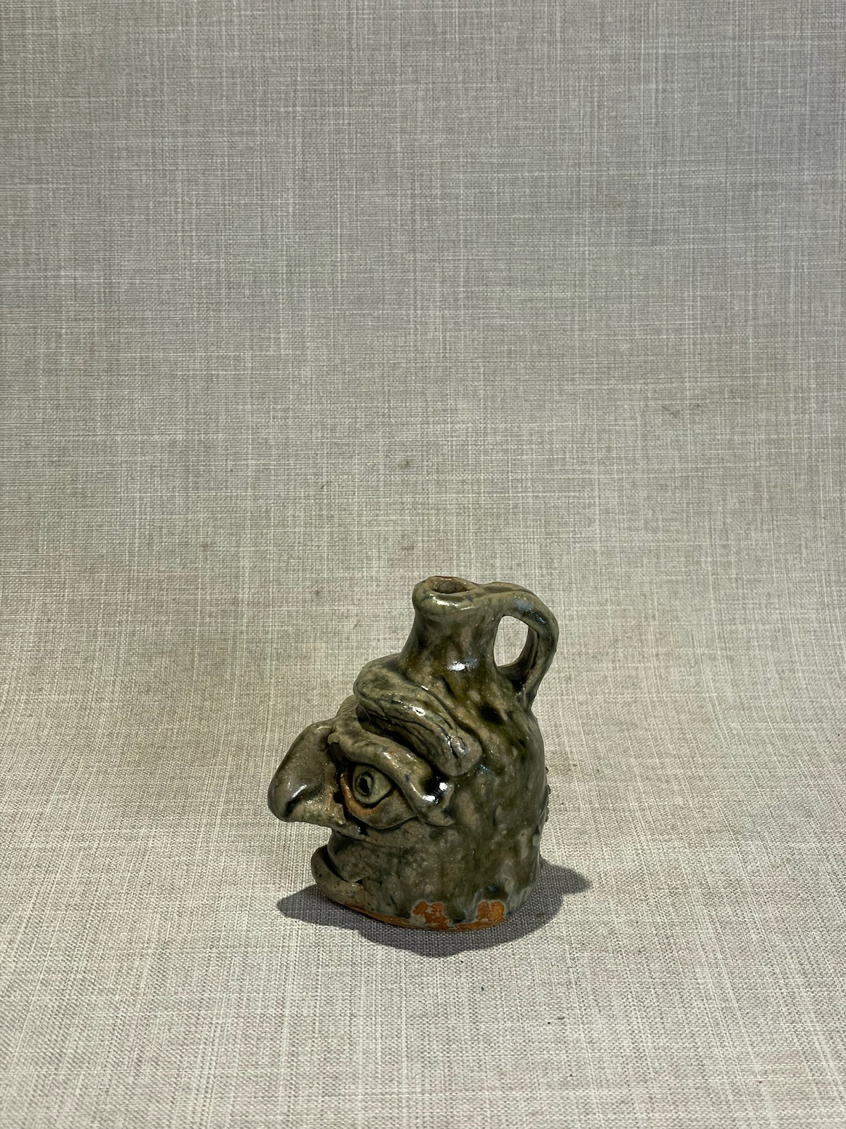 Signed Studio Art Pottery Face Jug “April Flowers” with Expressive Sculpted Features and Olive Drip Glaze