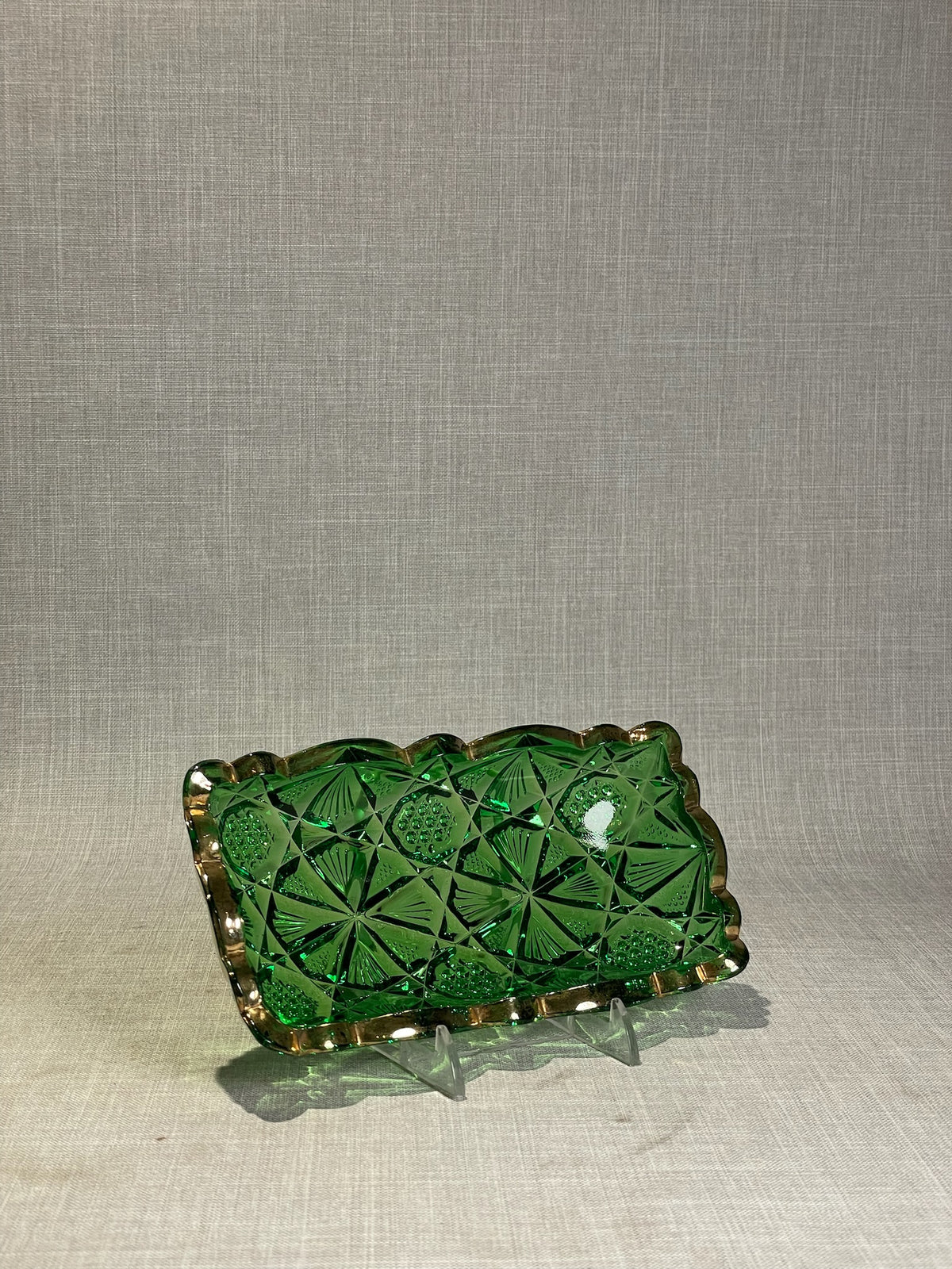 green pressed glass dish scalloped rim