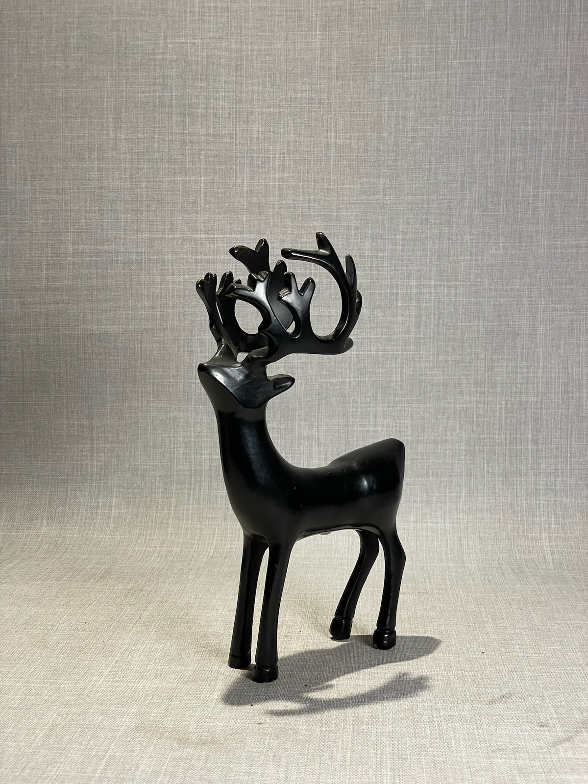 Elegant Modern Black Reindeer Sculpture with Abstract Antler Design