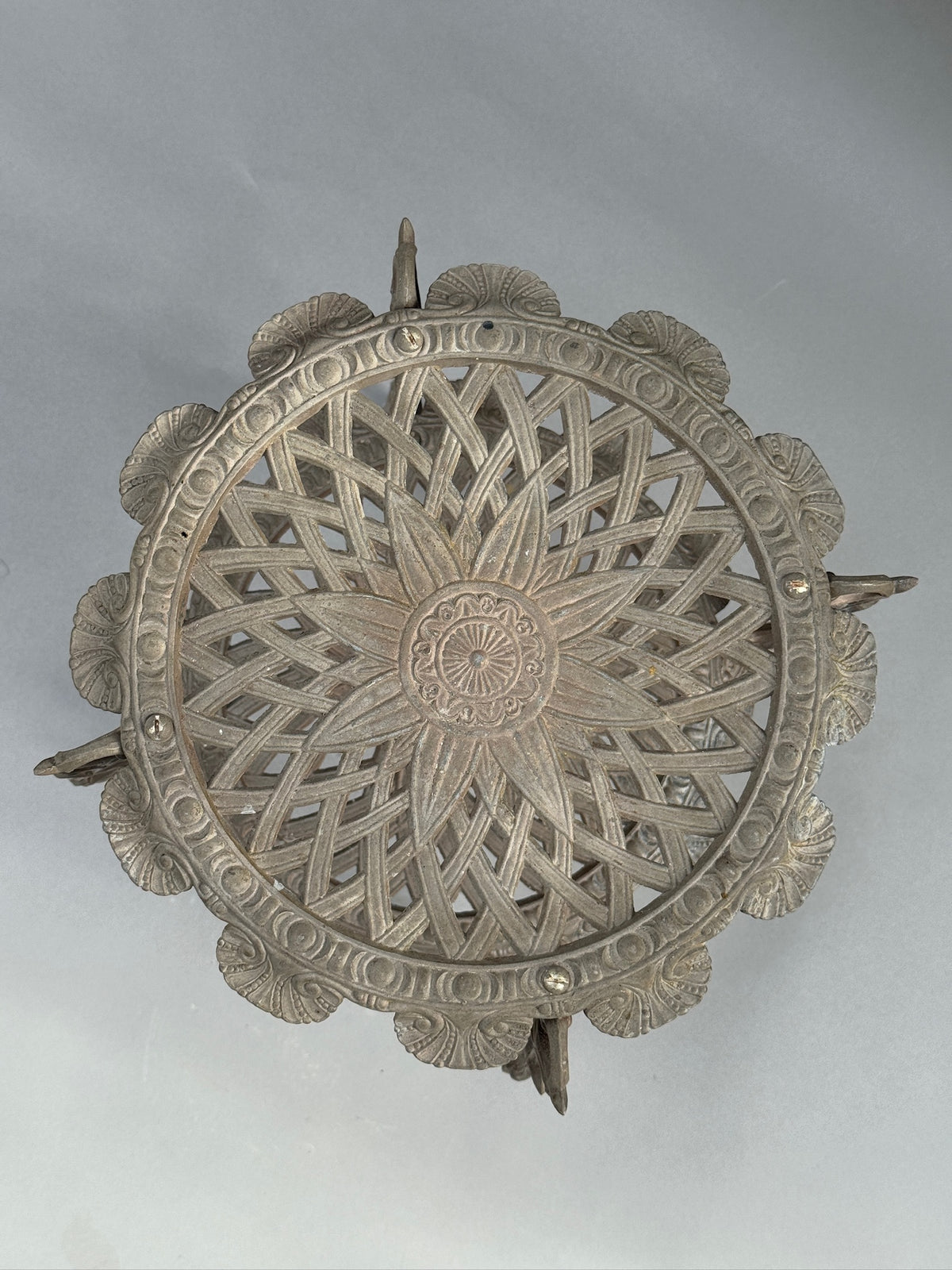 Ornate Victorian Revival Cast Iron Two-Tier Plant Stand with Pierced Floral Design top view showcasing intricate detailing. hommes + gardens estudio