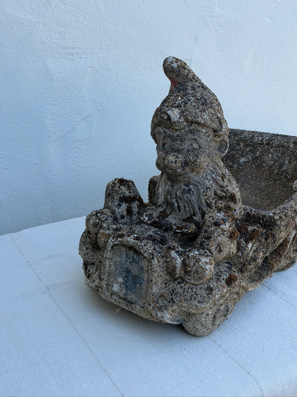 Side view of whimsical concrete garden gnome driving a wheelbarrow planter, circa 1960s — Hommes and Gardens, Fauna Collection, Pots + Planters Collection, Home Decor, Landscape Architect, Interior Designer, Outdoor Decorations, Garden Design, Home Design, Luxury Design, Art, Objects, Best Gifts, Nature, Backyard, Yard.