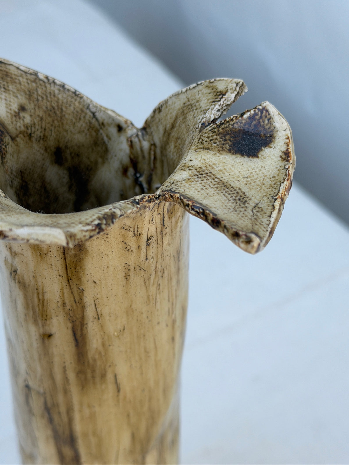 Cream ceramic vase with handbuilt organic texture