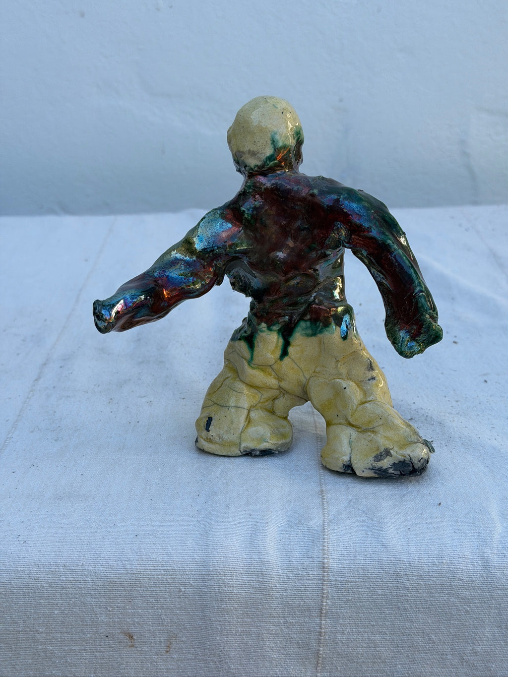 Detail of sculpted surface on abstract ceramic figure