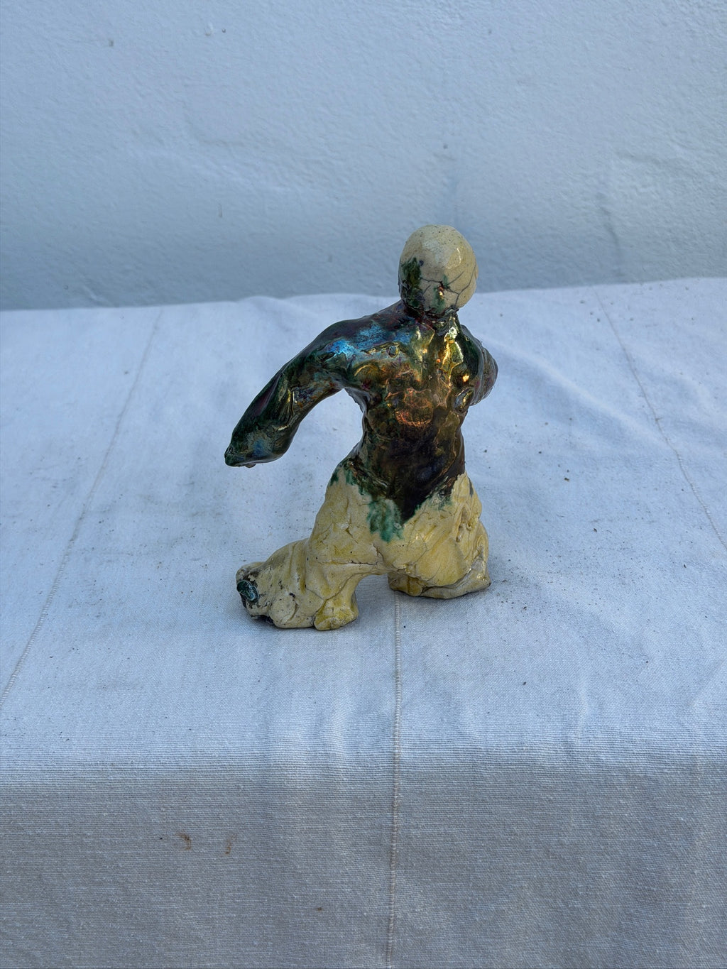 Close-up of glaze on handbuilt ceramic sculpture