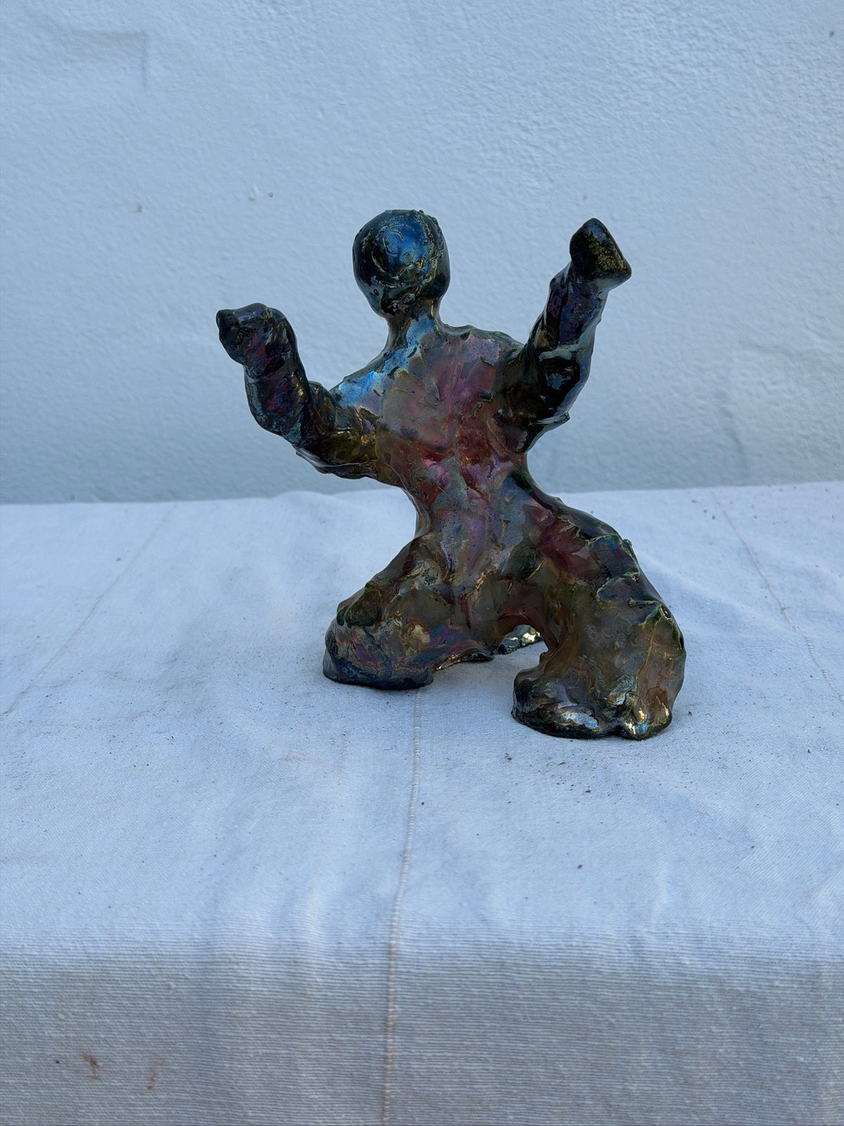 Detail of sculpted surface on abstract ceramic figure