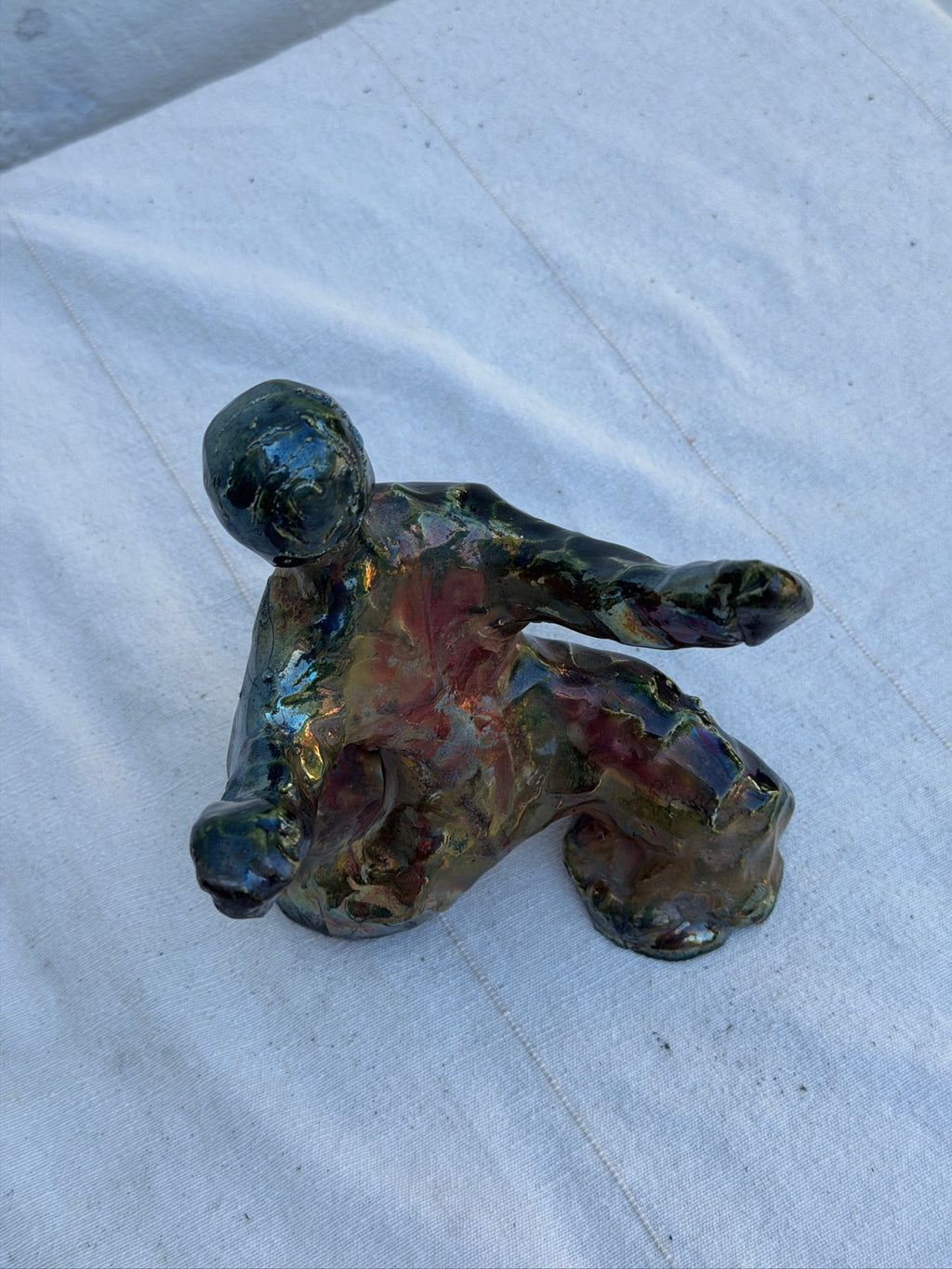Front view of abstract ceramic studio art figure