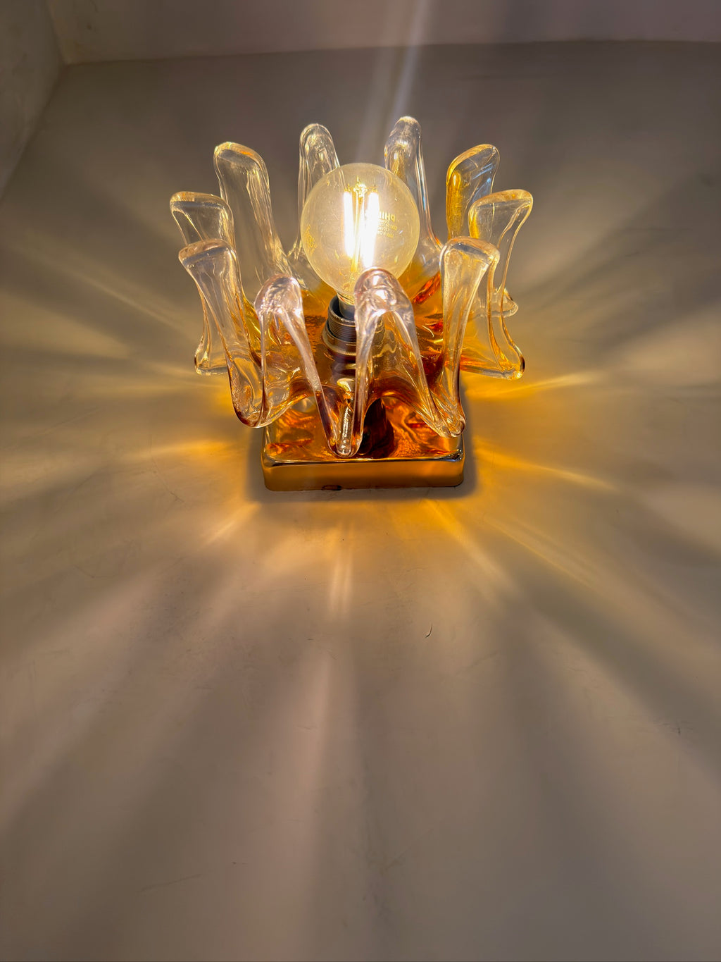Side view of Mazzega Murano wall light showing sculptural frosted orange glass profile — Hommes and Gardens, Lights + Lanterns Collection, Wallscape Collection, Home Decor, Interior Designer, Home Design, Luxury Design, Art, Italian Lighting, Murano Glass, Vintage Design, Mid-Century Modern.