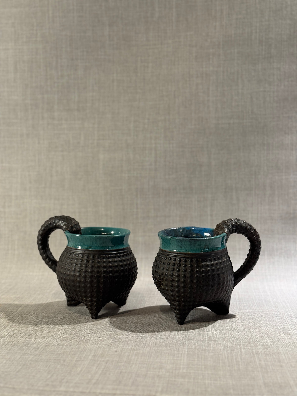 Artist-Signed Sandi Pierantozzi Ceramic Mugs – Textured Sea Urchin Design with Tentacle Handles (Set of 2)
