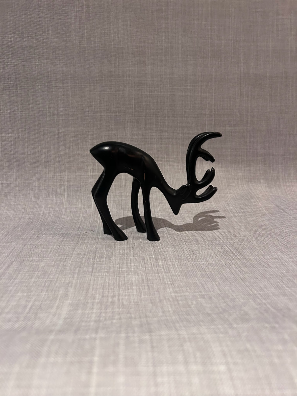 Set of Three Sculptural Black Deer Figures, Mid-Century Modern Scandinavian-Inspired Decorative Objects