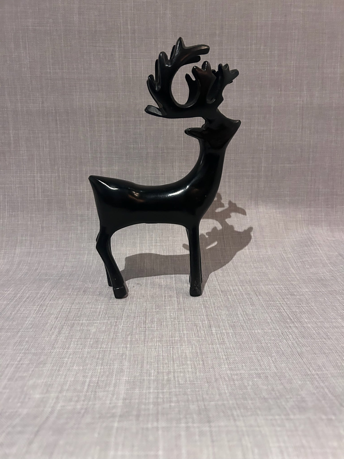 Set of Three Sculptural Black Deer Figures, Mid-Century Modern Scandinavian-Inspired Decorative Objects