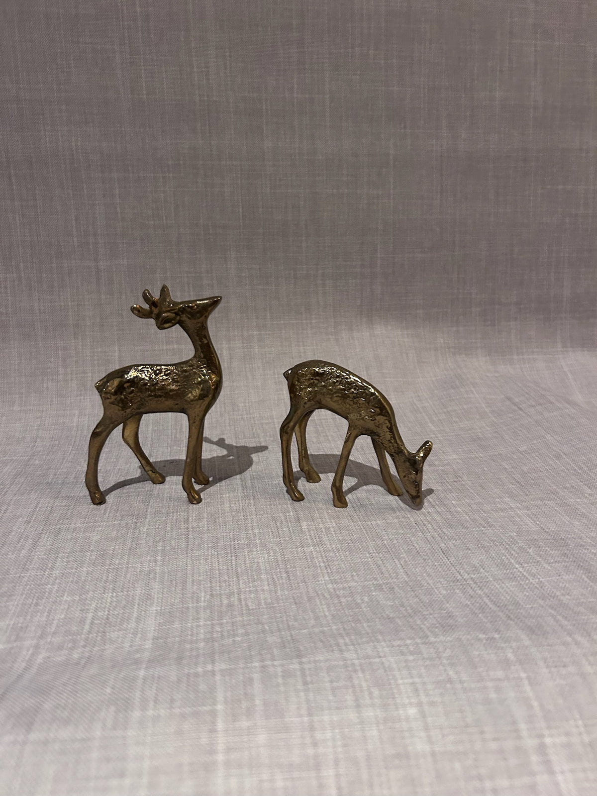 Elegant Mid-Century Solid Brass Deer Figurines, Sculptural Stag and Grazing Doe, Hollywood Regency Decorative Accent Set