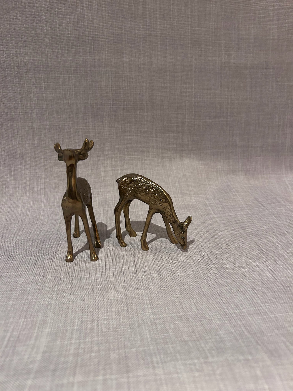 Elegant Mid-Century Solid Brass Deer Figurines, Sculptural Stag and Grazing Doe, Hollywood Regency Decorative Accent Set