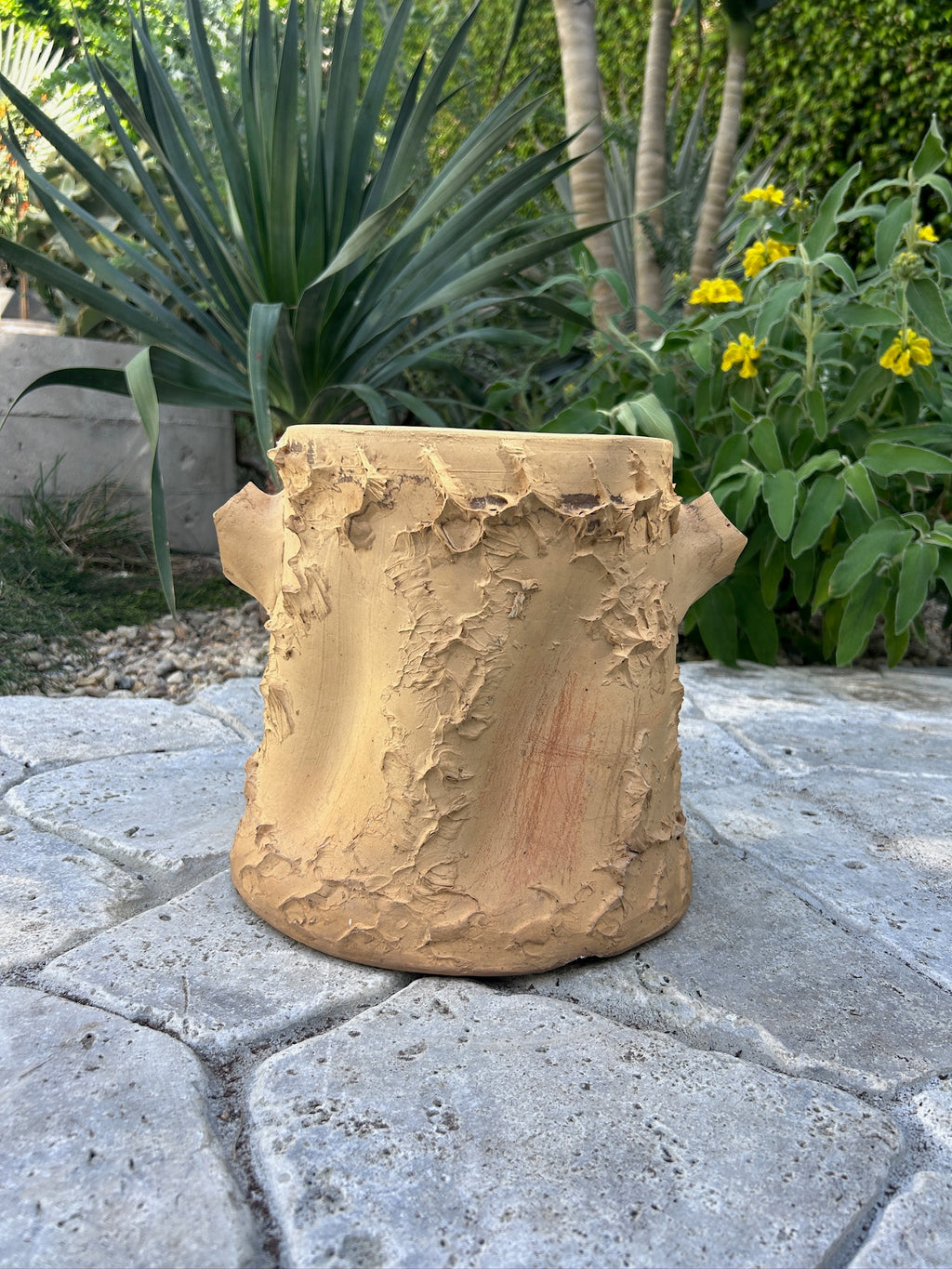 Side view of vintage faux bois terracotta planter