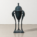 Art Nouveau style patinated metal incense burner with figural supports