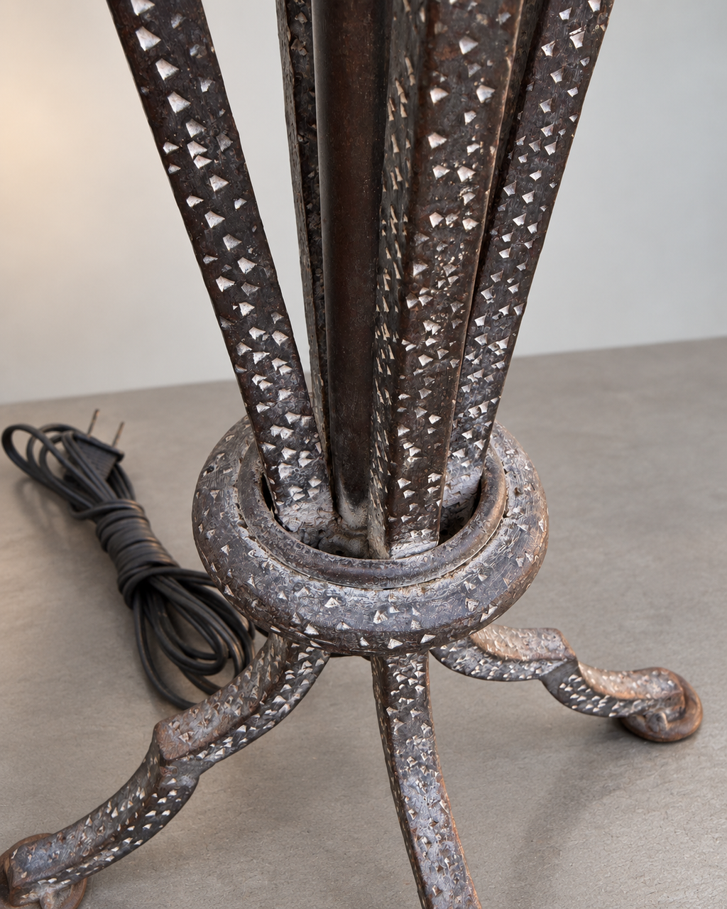 Close-up of wood and metal details on sculptural table lamp