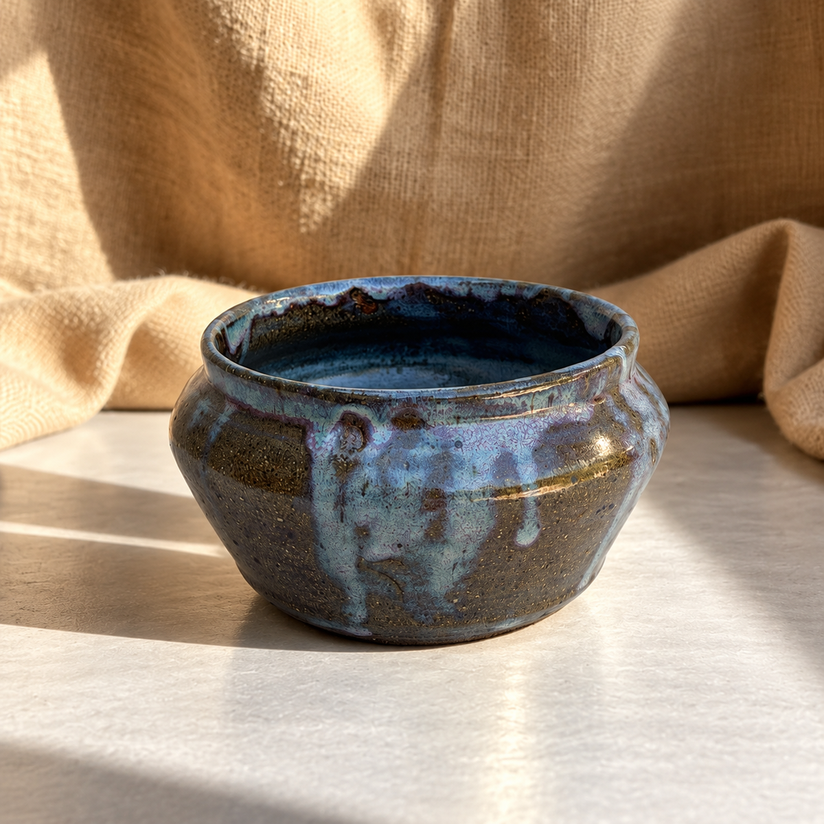 Signed TW studio pottery bowl with flowing multicolor glaze