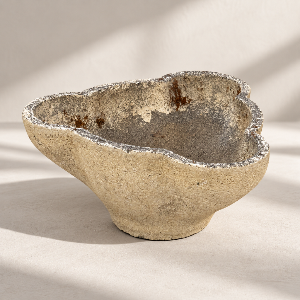 Side view of mid-century concrete clover planter