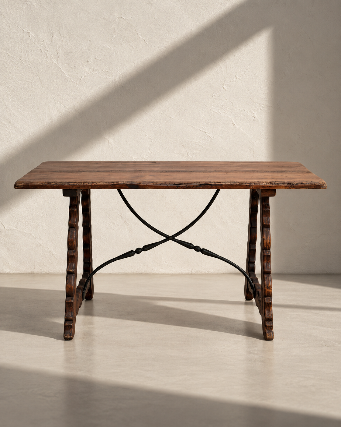 Spanish Revival wood and wrought iron console table with scalloped legs