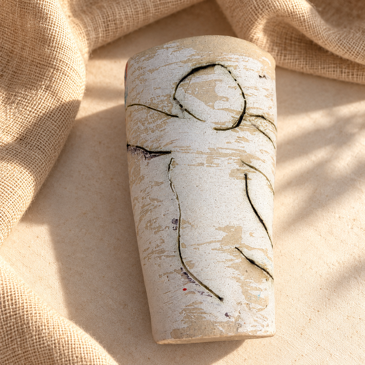 Close-up of abstract decoration on studio pottery vase