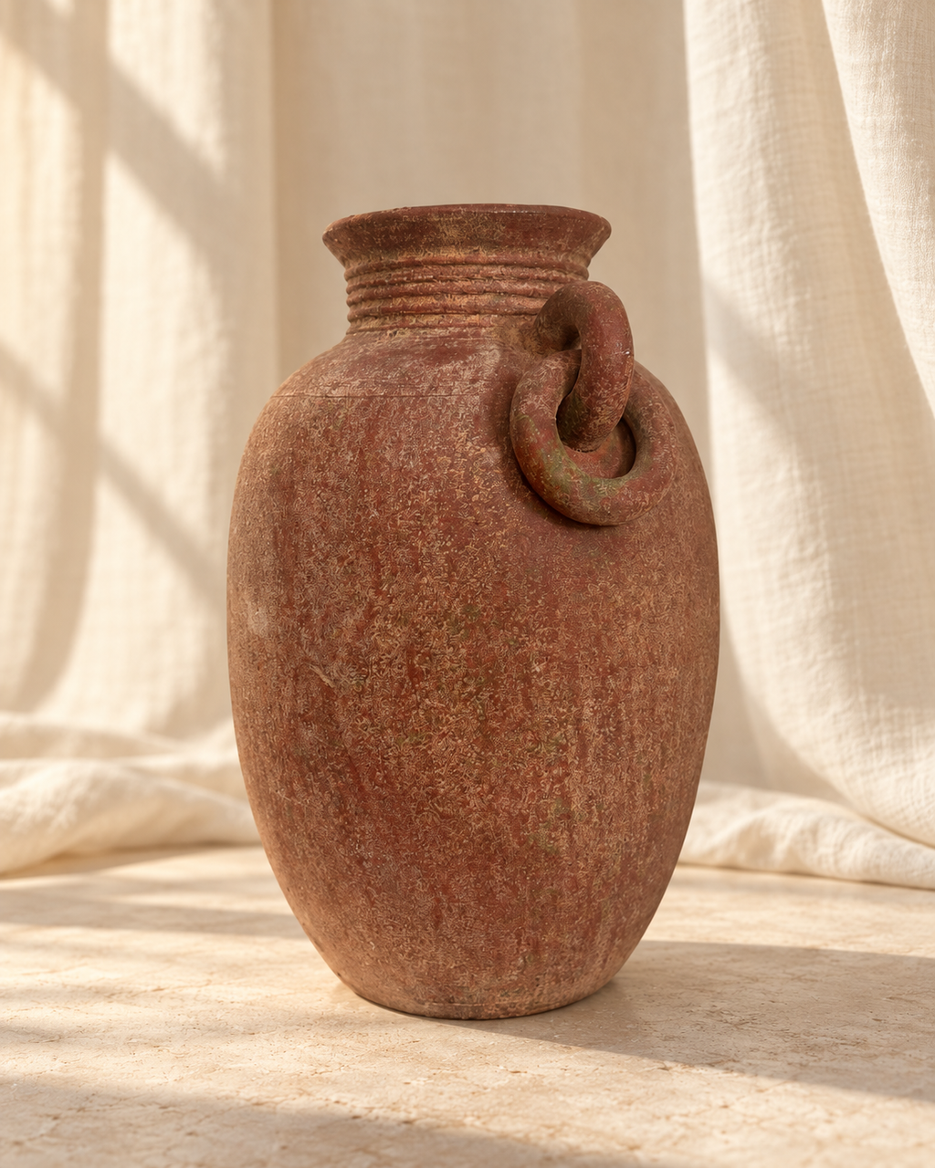 Side view of antique earthenware amphora vase