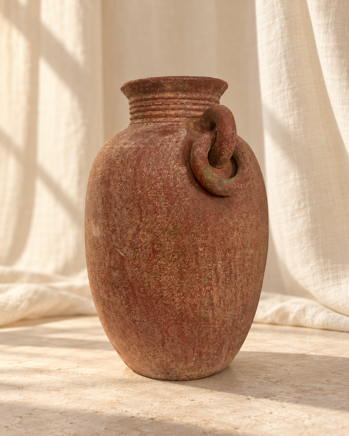 Side view of antique earthenware amphora vase