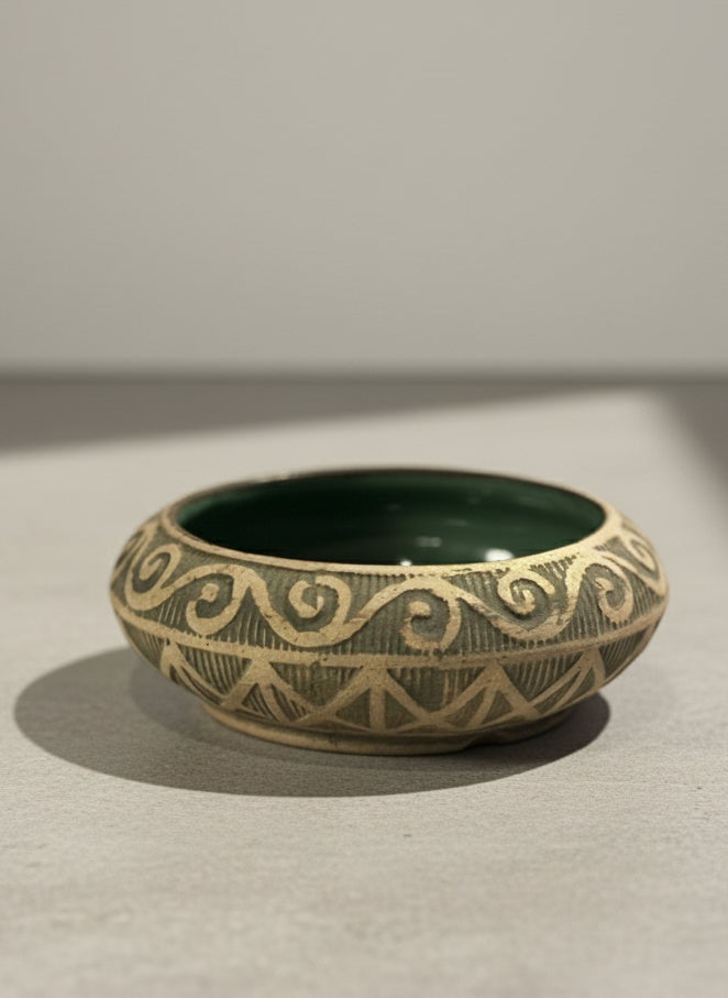 vintage hand decorated terracotta bowl with green glaze interior